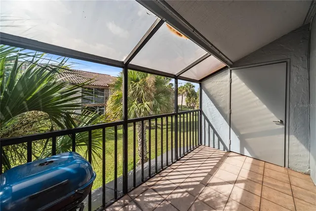 a view of balcony with furniture