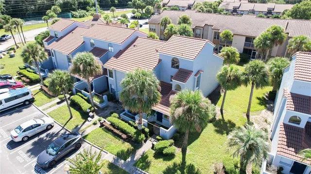an aerial view of a house with garden