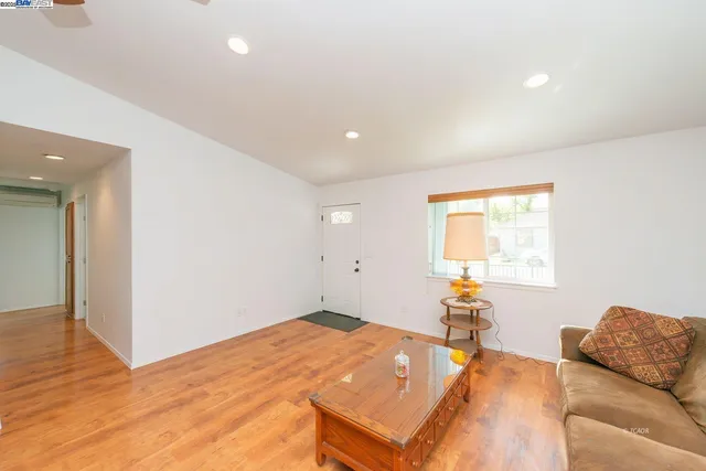 a bed room with a bed and a couch