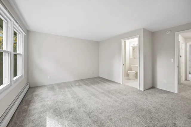 an empty room with windows