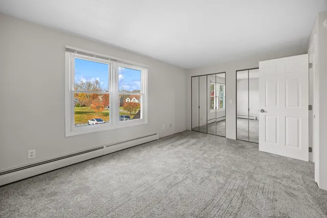 an empty room with windows