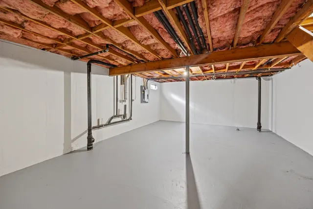 a view of a room with wooden walls