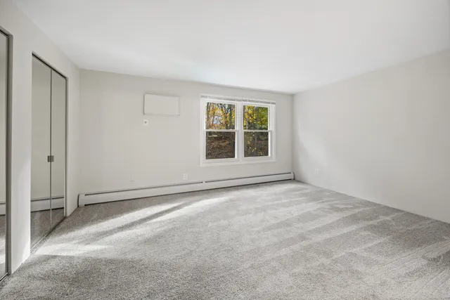 an empty room with windows