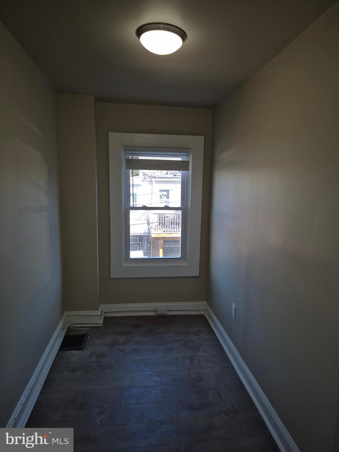707 North Duncan Street Baltimore, MD 21205 - Photo 14 of 28 an empty room with a empty space and window
