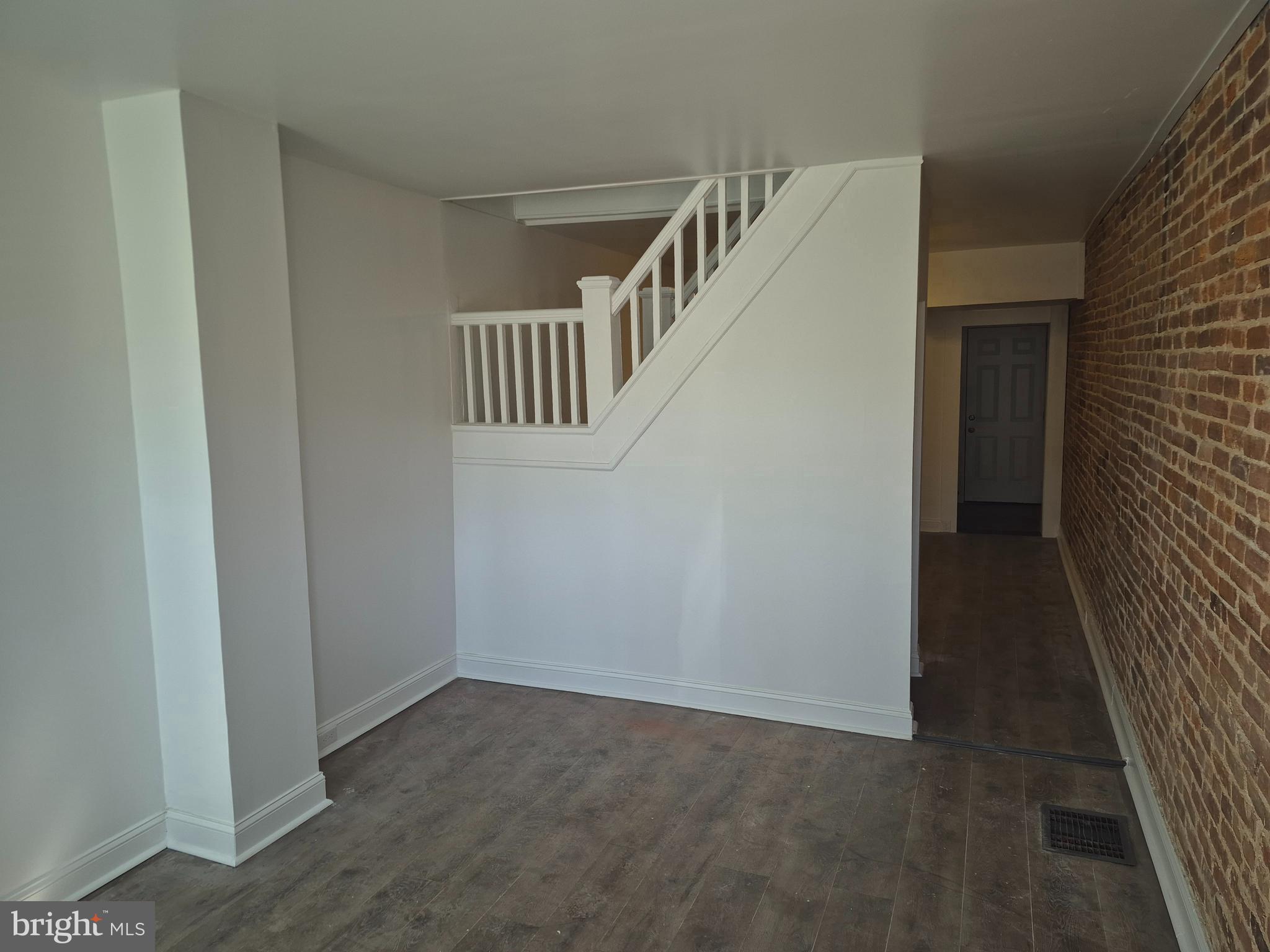 707 North Duncan Street Baltimore, MD 21205 - Photo 4 of 28 a view of hallway with stairs
