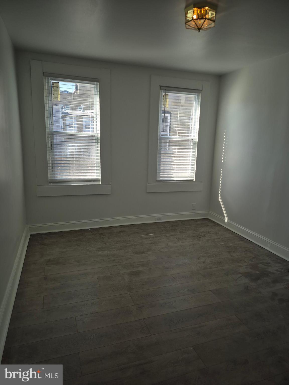 707 North Duncan Street Baltimore, MD 21205 - Photo 9 of 28 an empty room with a window