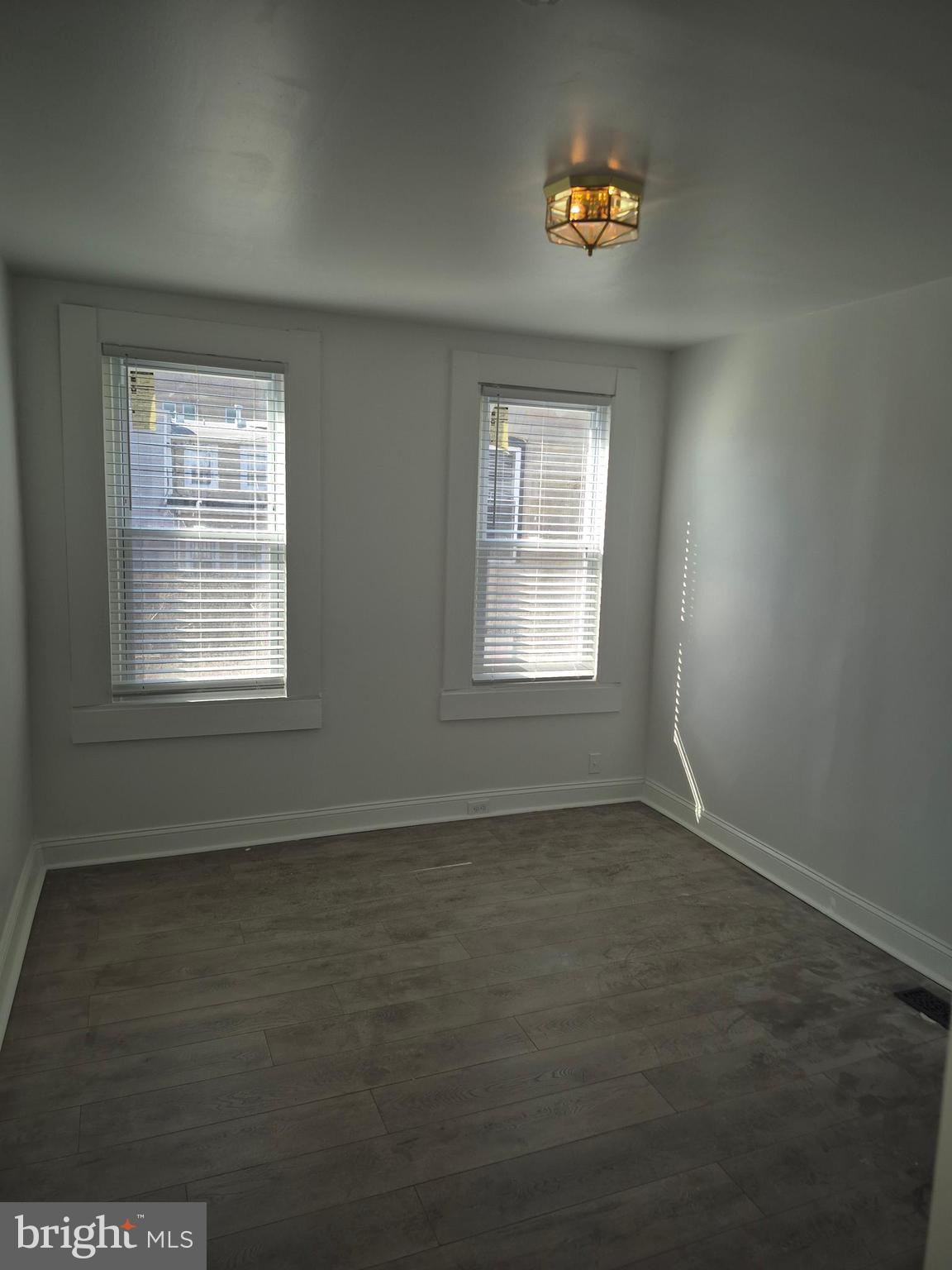 707 North Duncan Street Baltimore, MD 21205 - Photo 10 of 28 an empty room with a window