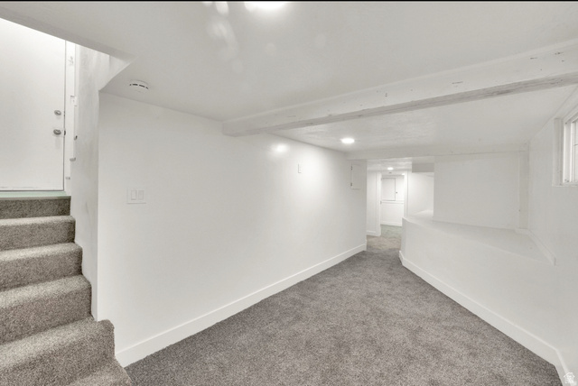 197 West Center Street Midvale, UT 84047 - Photo 11 of 12 Finished basement with baseboards and carpet flooring