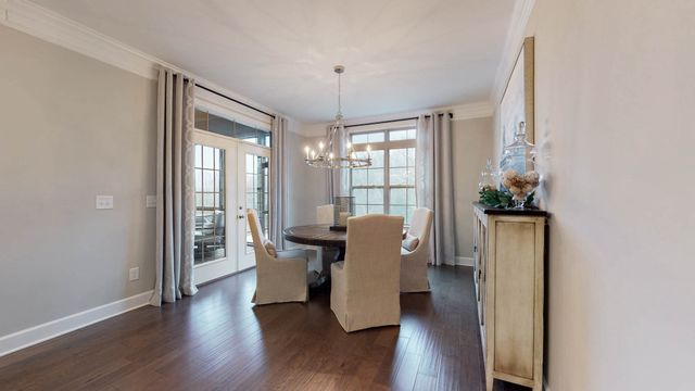 a living room with furniture fireplace and flat screen tv