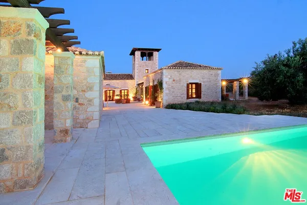 a outdoor space with furniture and wooden floor