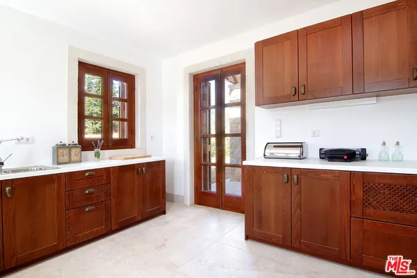 a view of a swimming pool with a lounge chairs