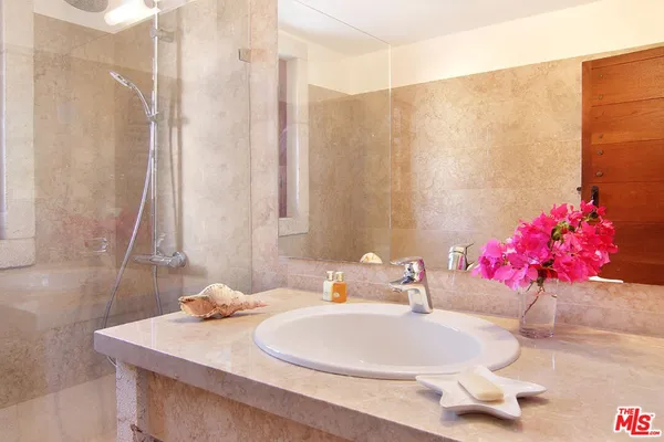 a bedroom with a bed and closet