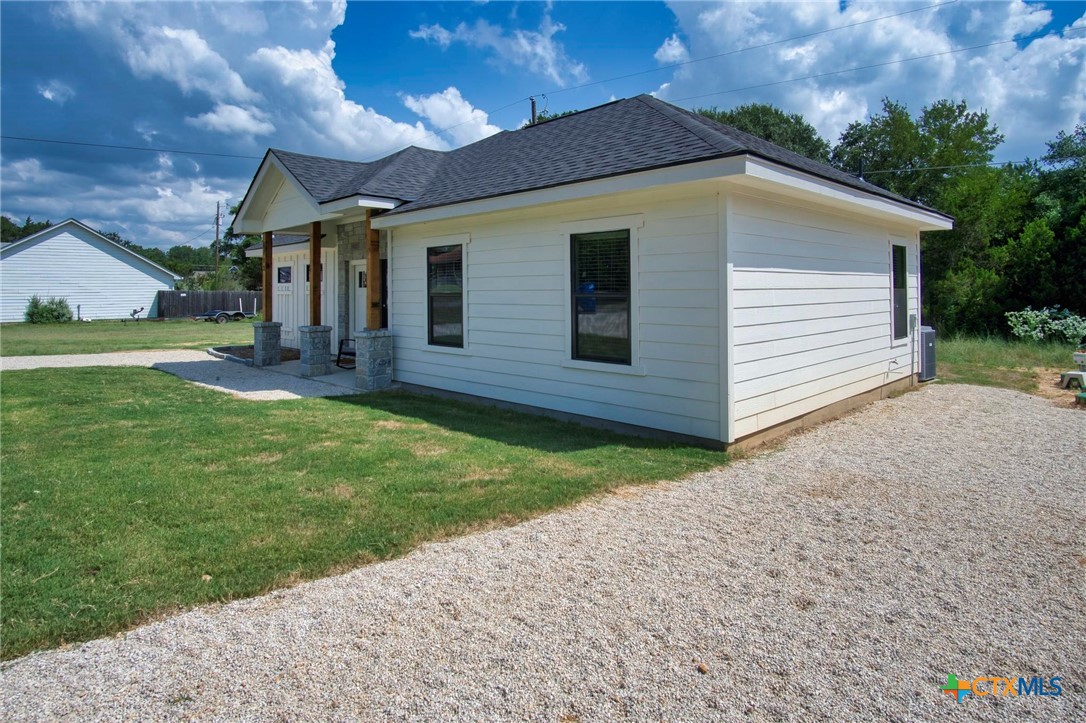 1112 Greenhill Drive Canyon Lake, TX 78133 - Photo 19 of 19 a view of a backyard of the house