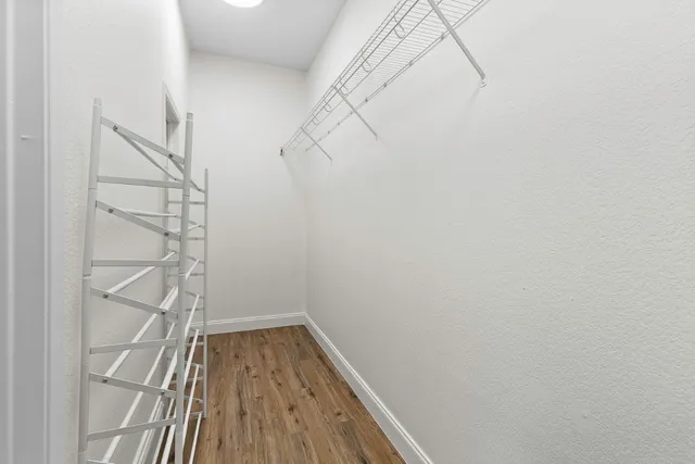 a view of a room with racks on the wall