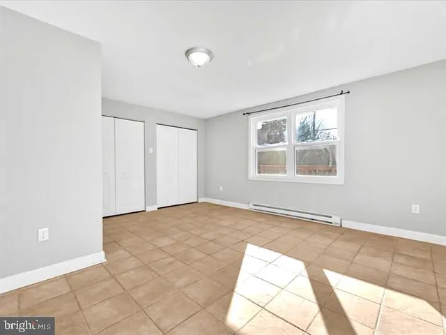 a view of an empty room with window