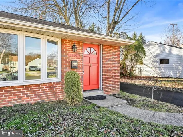 a view of front door of house with outdoor space