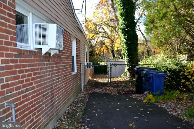 a backyard of a house with sitting area