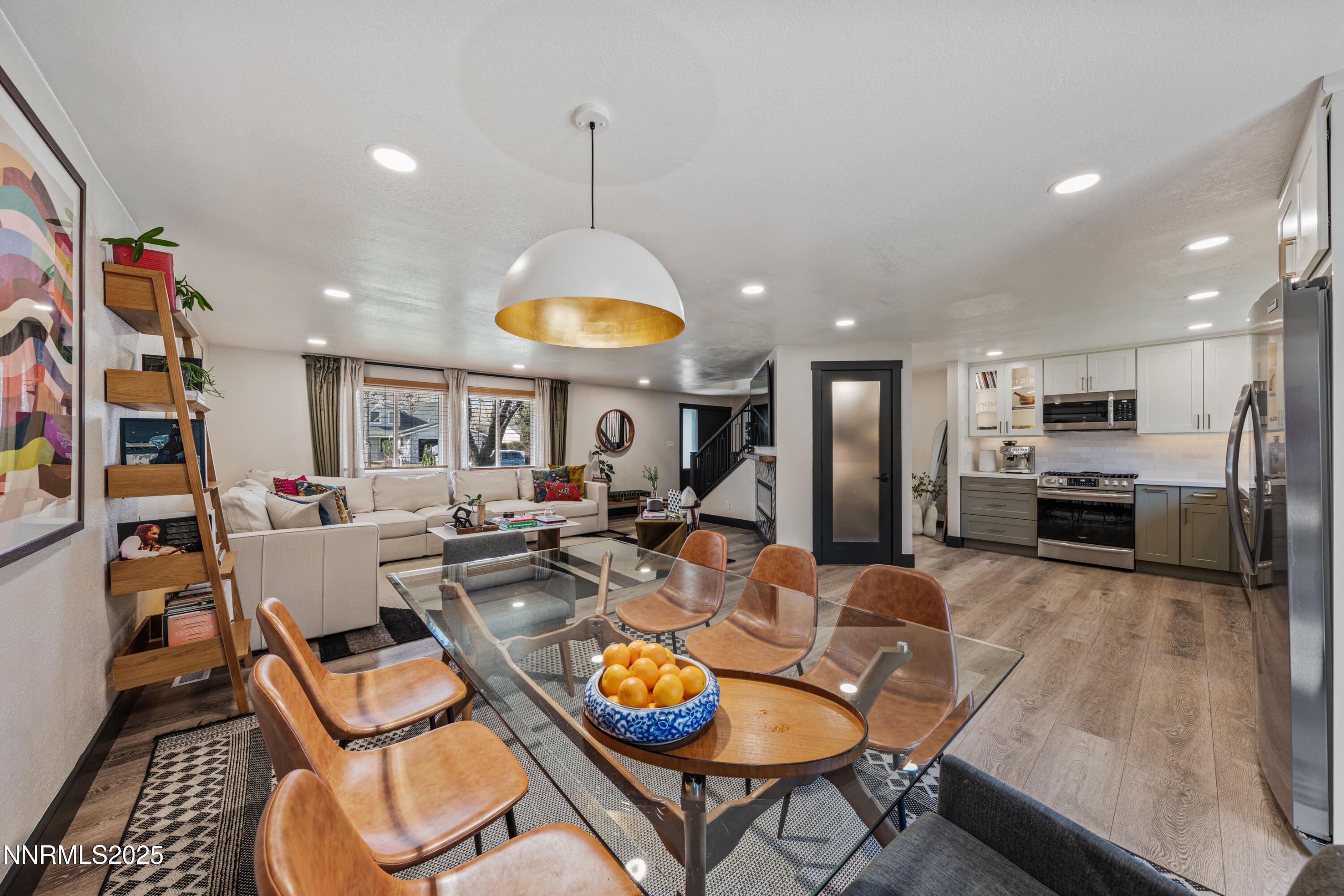 7520 Berryhill Drive Reno, NV 89511 - Photo 15 of 72 a living room with furniture kitchen and a chandelier