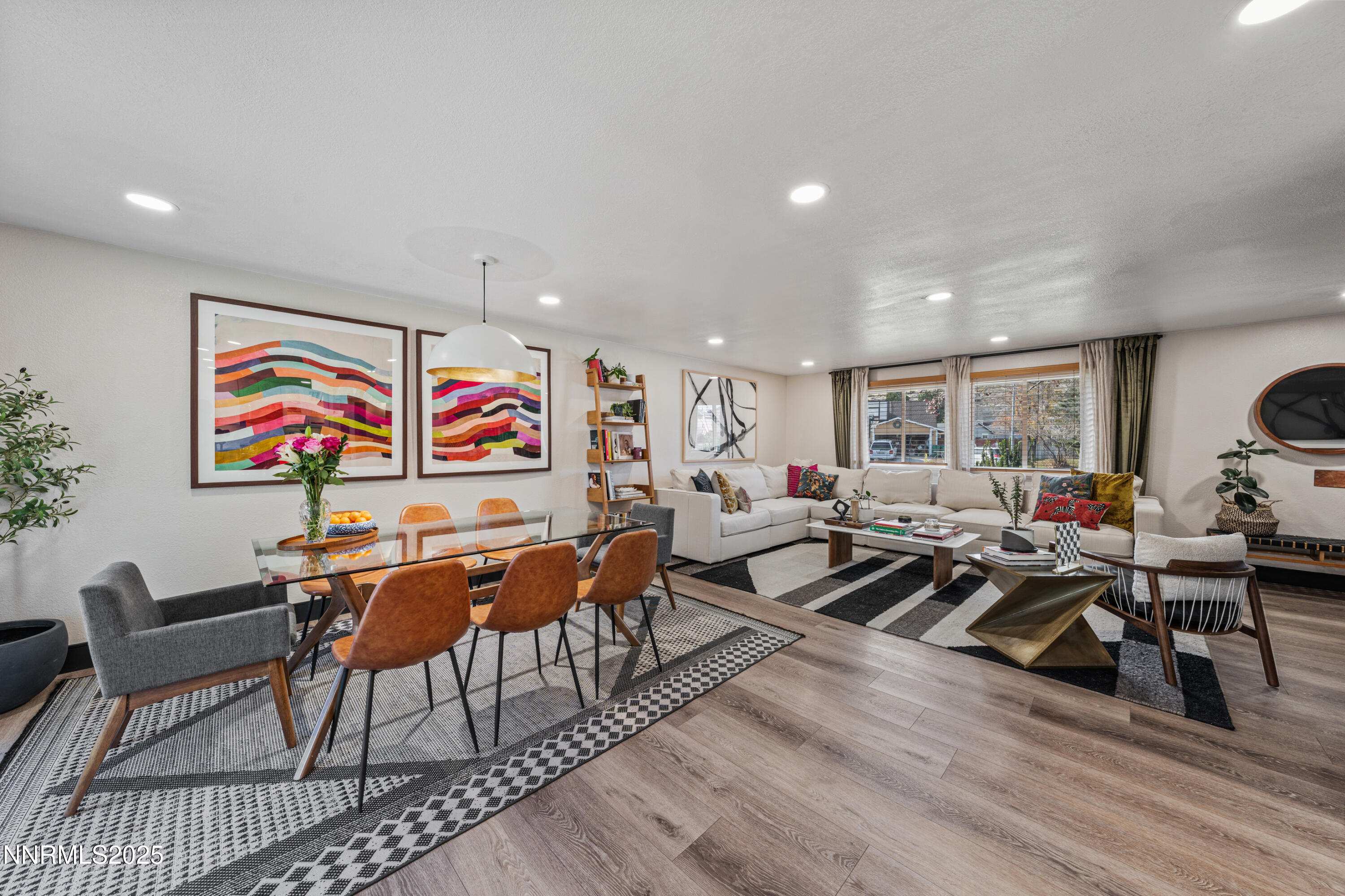 7520 Berryhill Drive Reno, NV 89511 - Photo 17 of 72 a living room with furniture kitchen view and a wooden floor