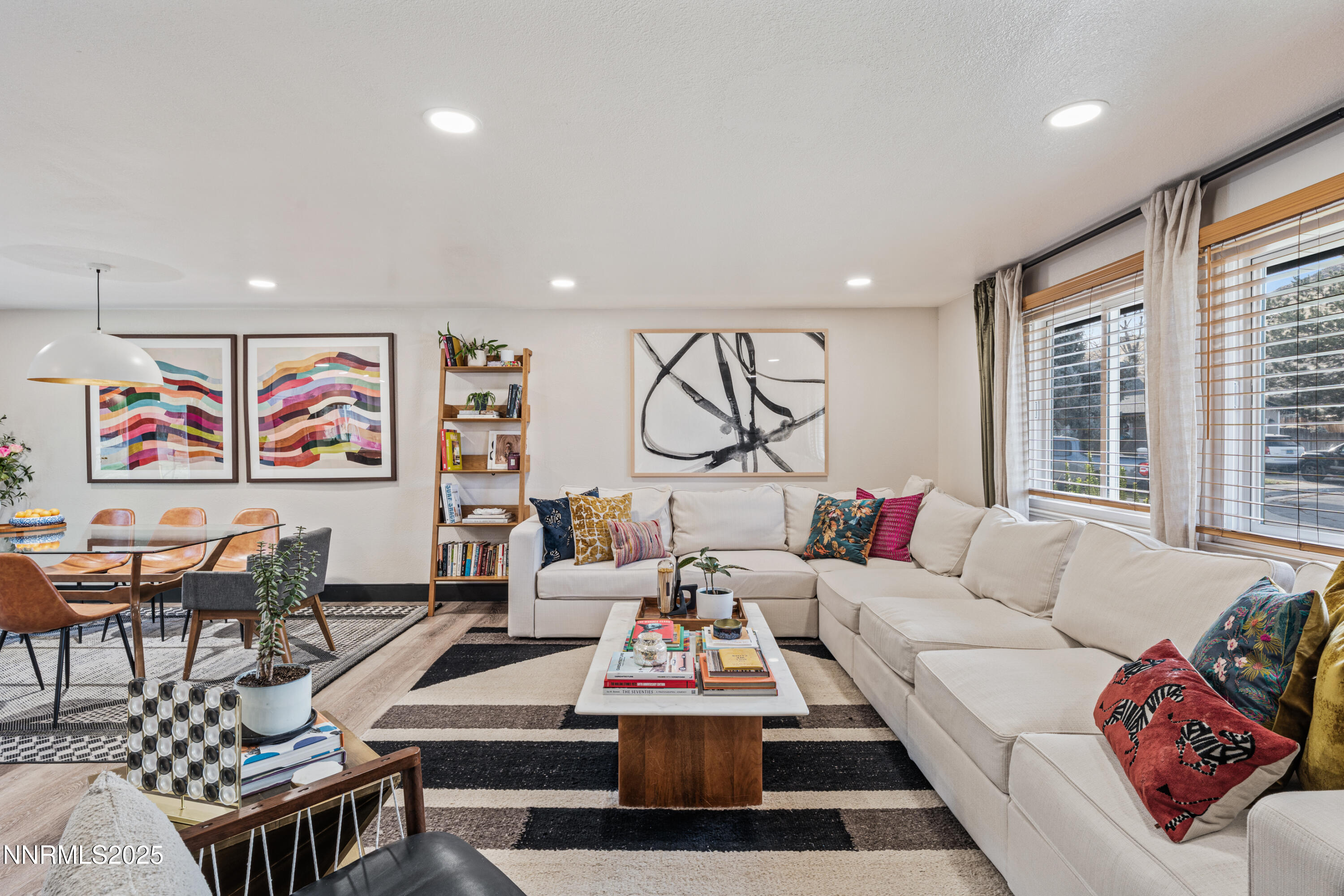 7520 Berryhill Drive Reno, NV 89511 - Photo 18 of 72 a living room with furniture a rug and a large window