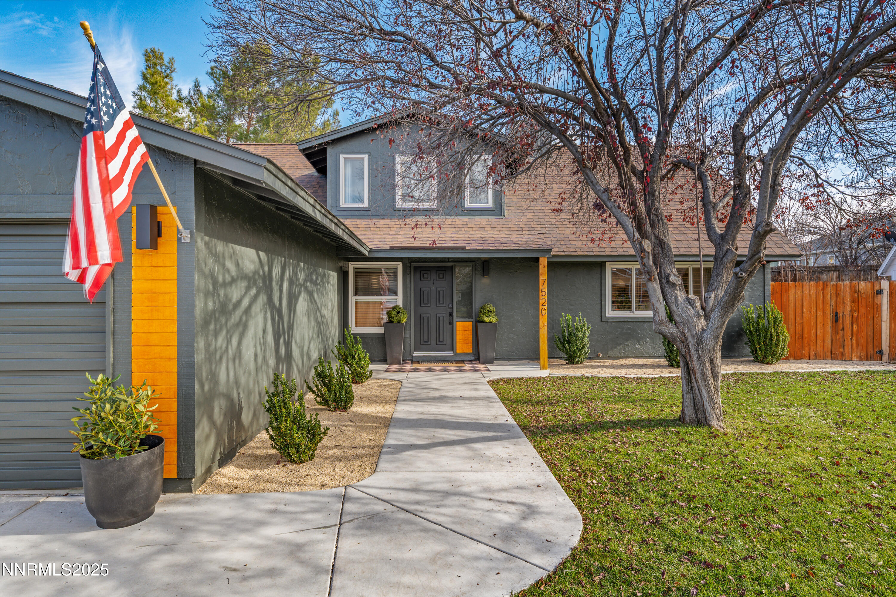 7520 Berryhill Drive Reno, NV 89511 - Photo 2 of 72 a front view of a house with a porch