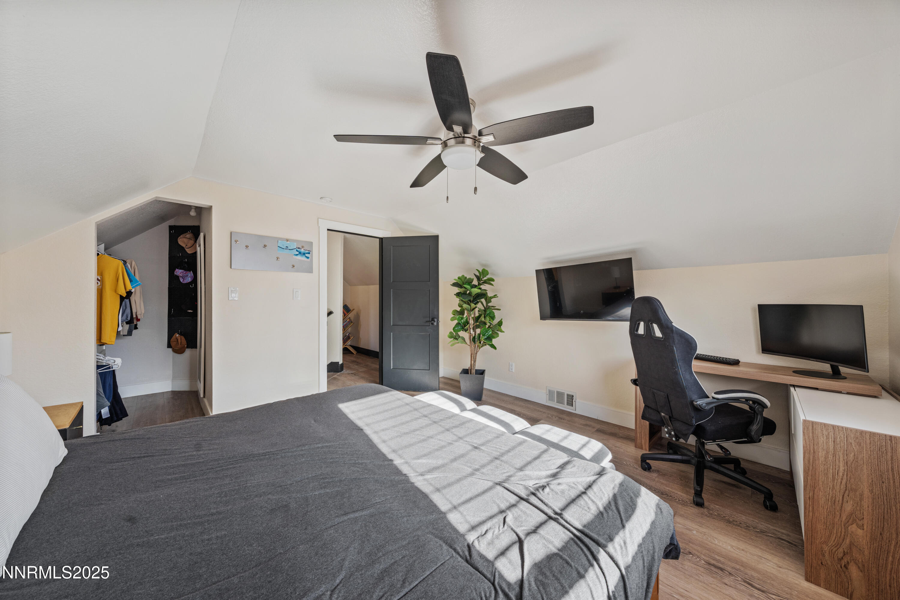 7520 Berryhill Drive Reno, NV 89511 - Photo 42 of 72 a bedroom with a bed and a flat screen tv