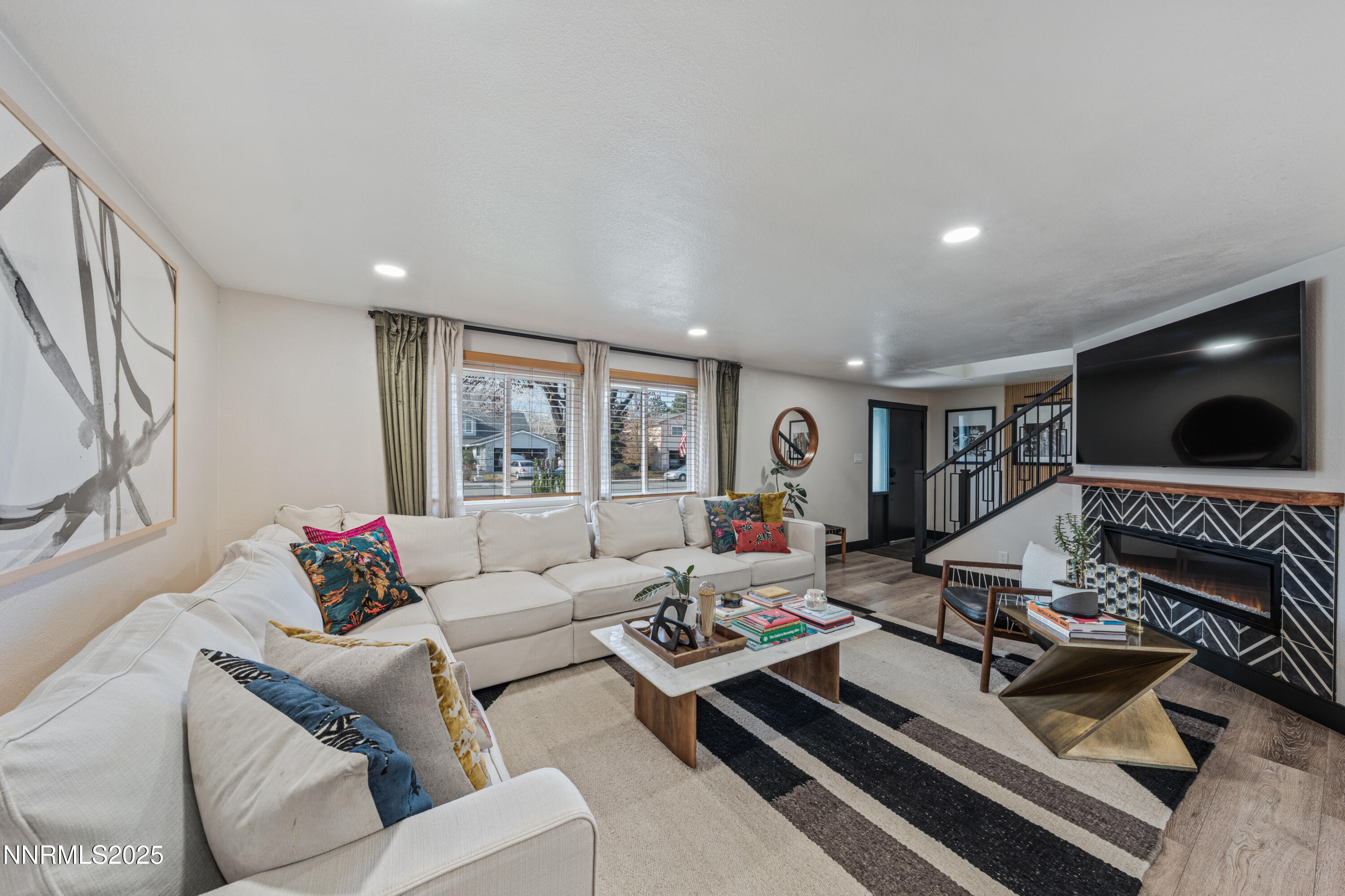 7520 Berryhill Drive Reno, NV 89511 - Photo 5 of 72 a living room with furniture and a flat screen tv