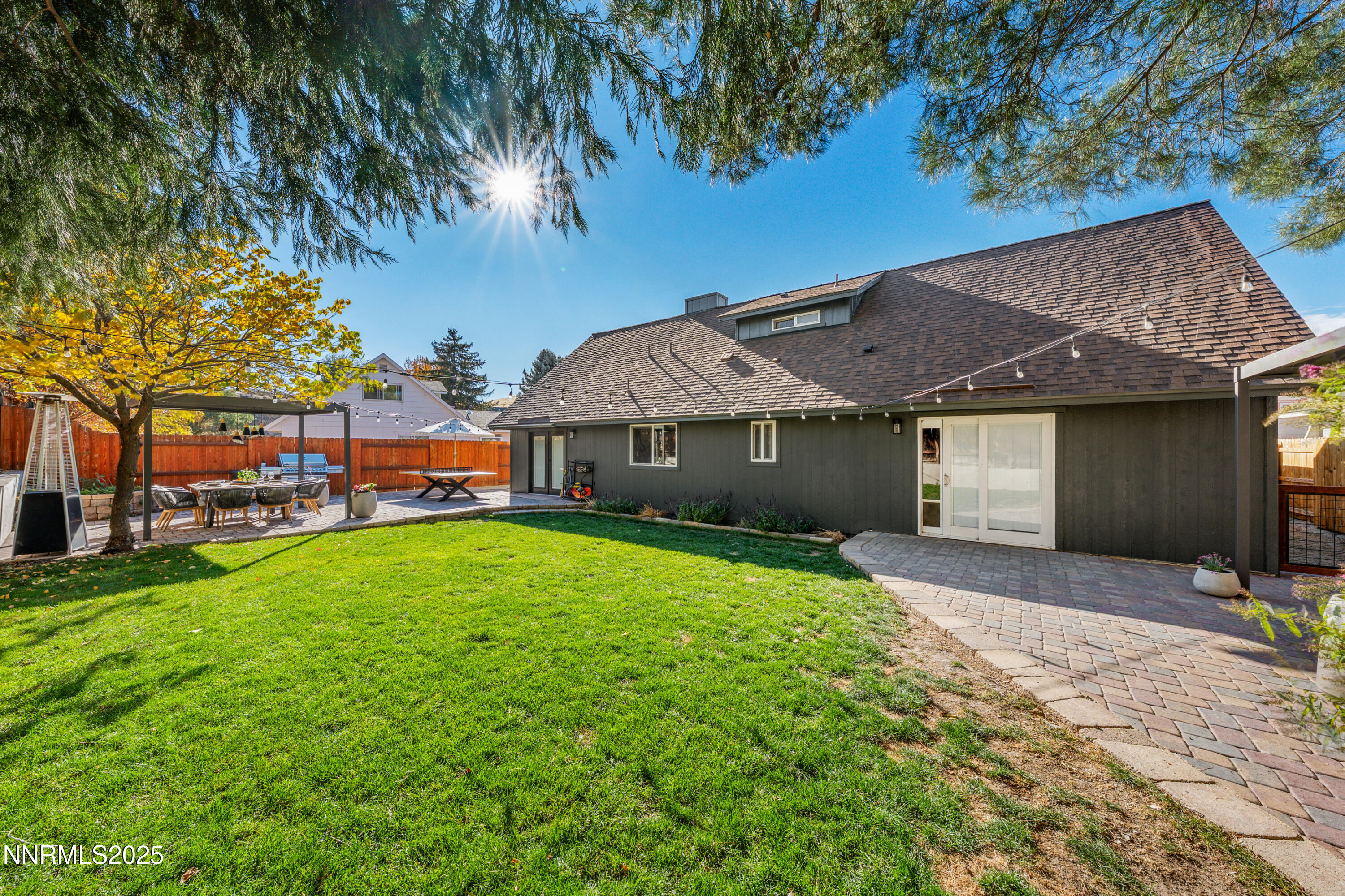 7520 Berryhill Drive Reno, NV 89511 - Photo 62 of 72 a front view of a house with a garden and yard
