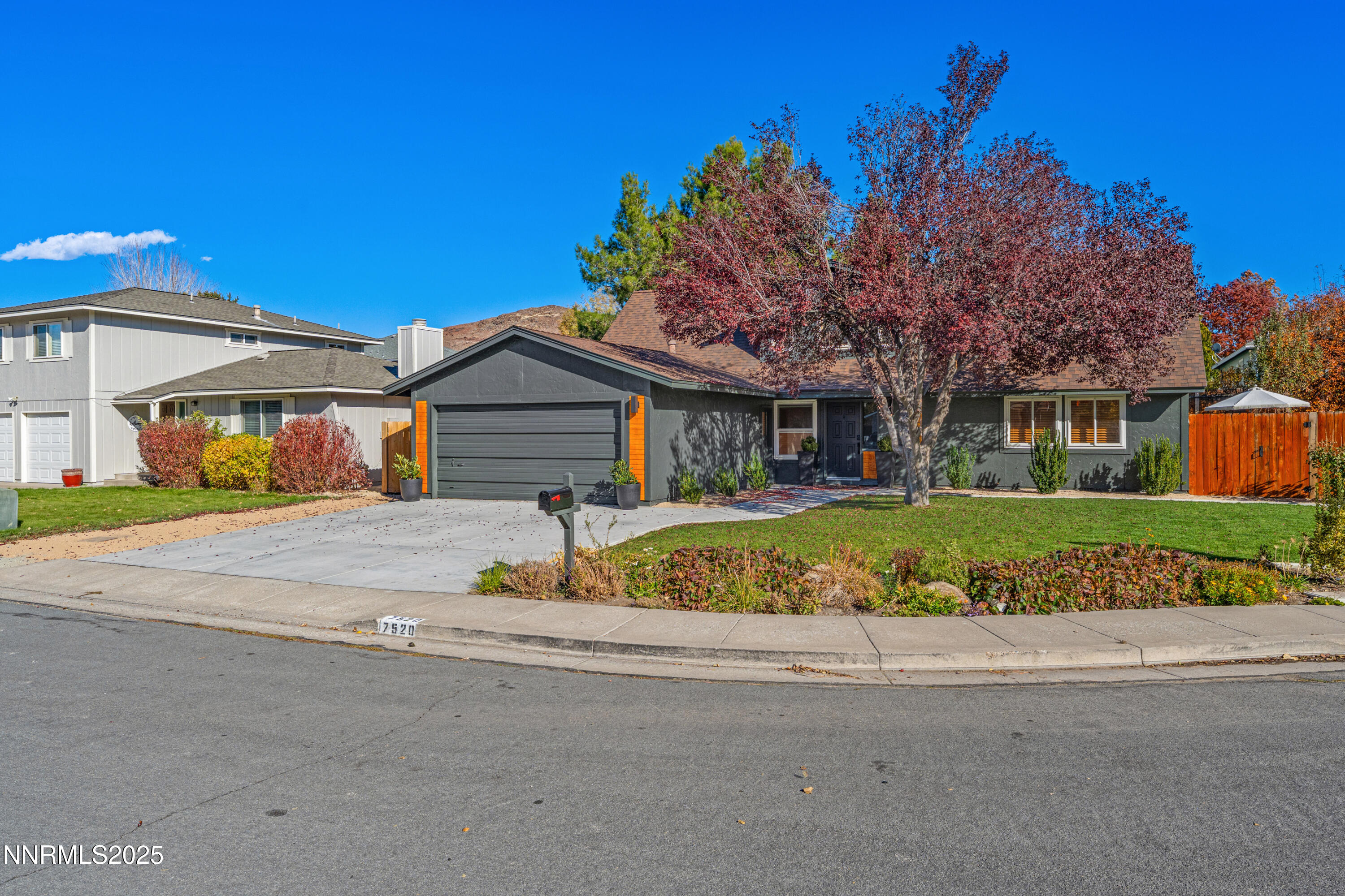 7520 Berryhill Drive Reno, NV 89511 - Photo 72 of 72 a front view of a house with a yard