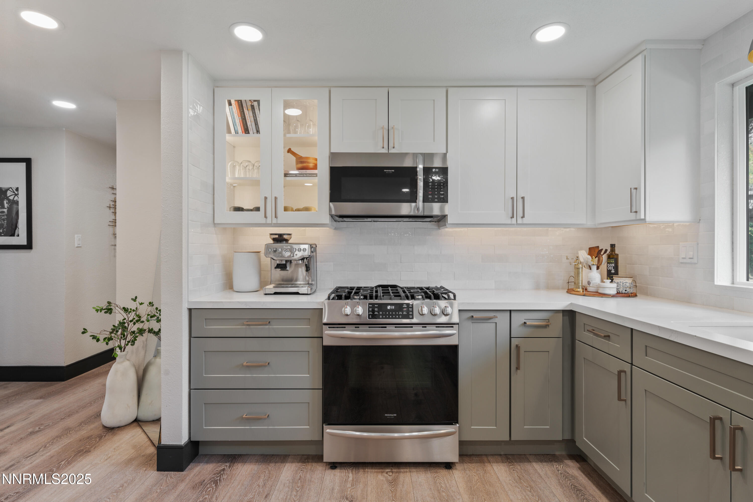 7520 Berryhill Drive Reno, NV 89511 - Photo 9 of 72 a kitchen with granite countertop a stove and a sink