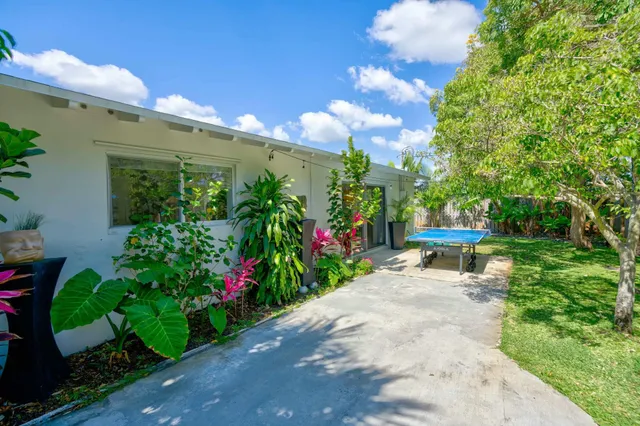 a view of a garden with a bench