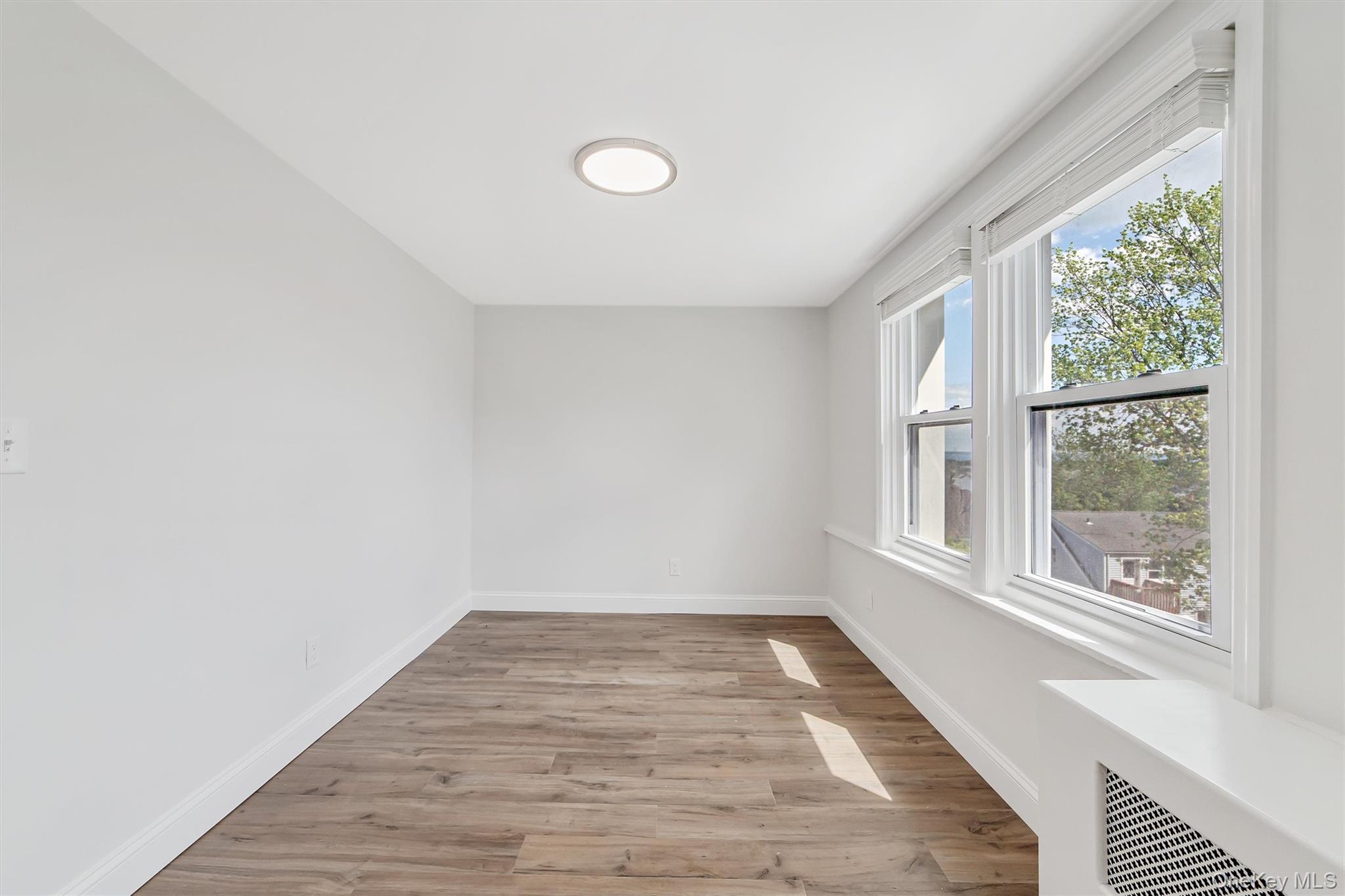 69 Prospect Street, Unit 2 Port Chester, NY 10573 - Photo 19 of 29 a view of an empty room and window