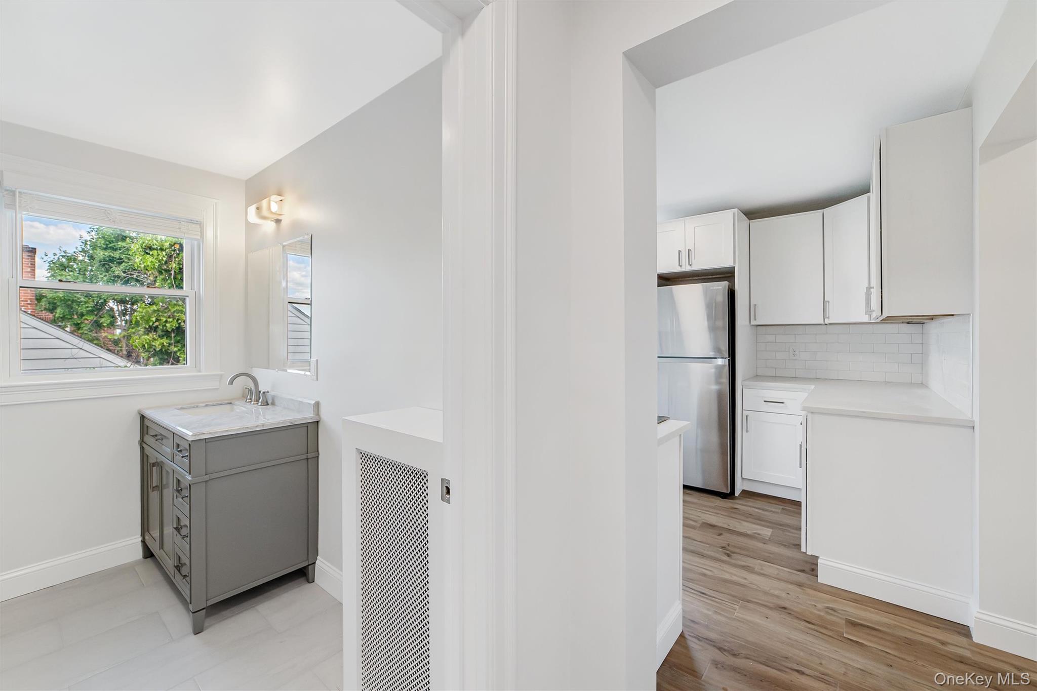 69 Prospect Street, Unit 2 Port Chester, NY 10573 - Photo 6 of 29 a bathroom with a sink and a mirror