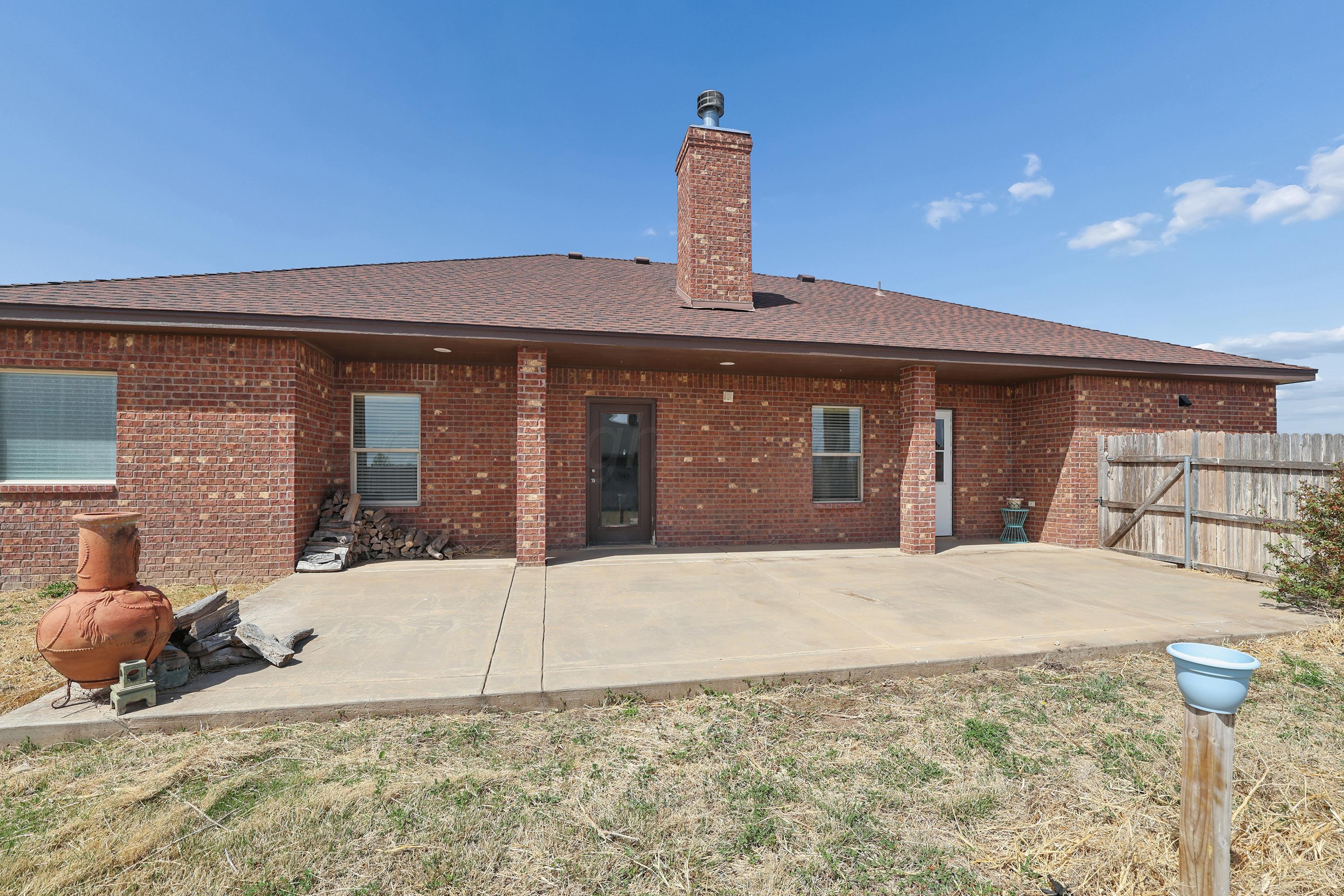 19101 Sundancer Lane Bushland, TX 79124 - Photo 23 of 25 a front view of a house with garden