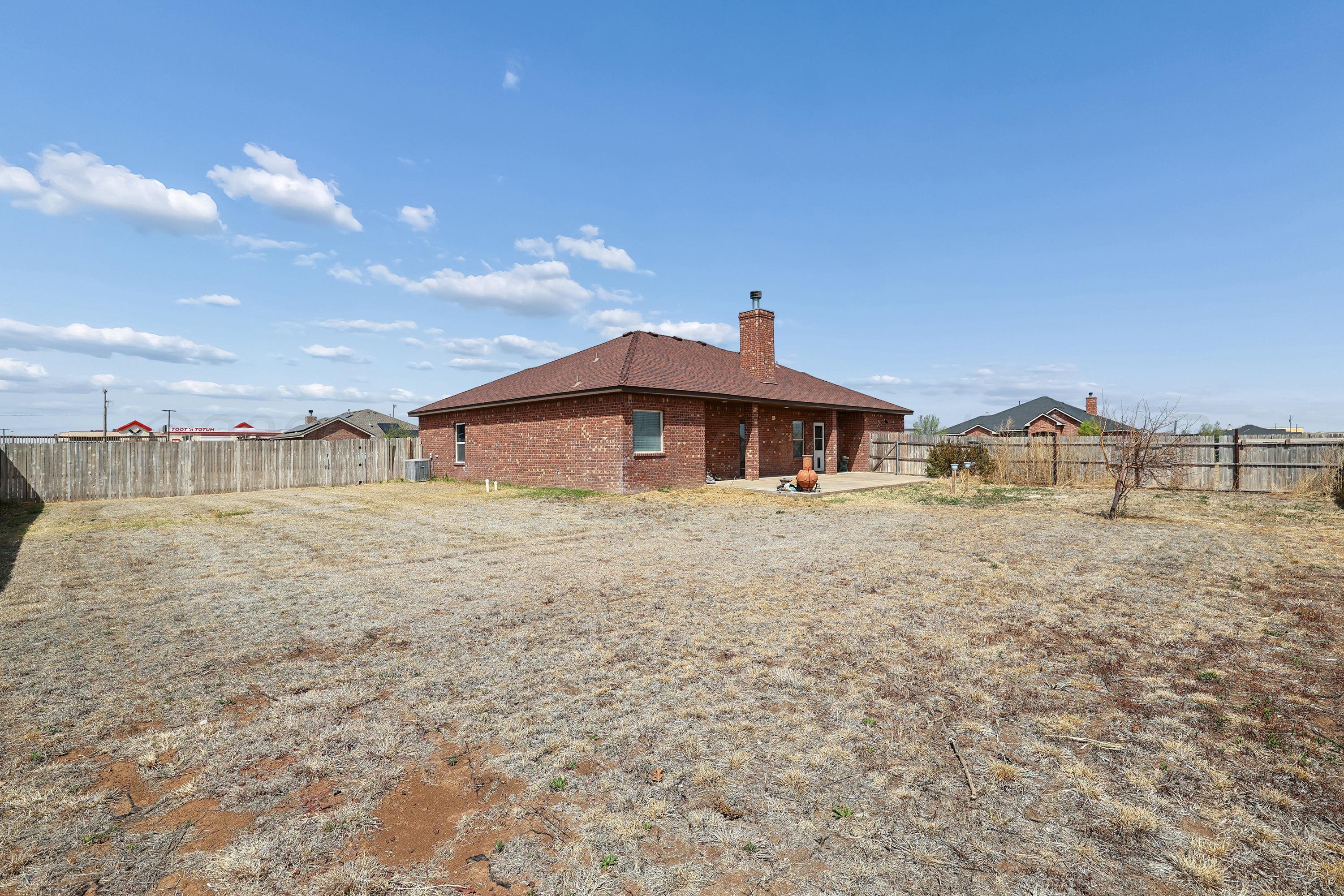 19101 Sundancer Lane Bushland, TX 79124 - Photo 25 of 25 a front view of a house with a yard