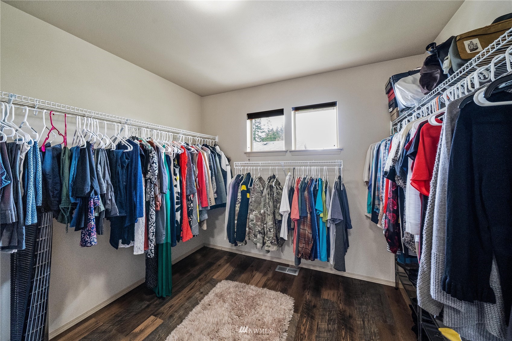 1589 Grant Avenue DuPont, WA 98327 - Photo 24 of 30 a view of walk in closet with clothes