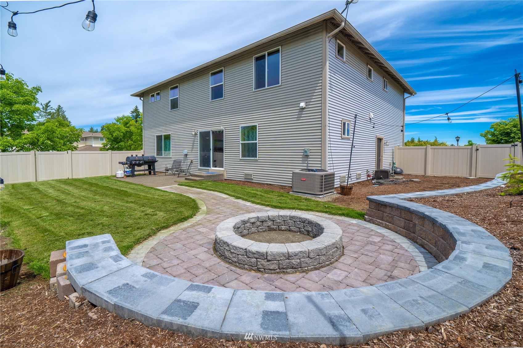 1589 Grant Avenue DuPont, WA 98327 - Photo 27 of 30 a view of a house with a swimming pool