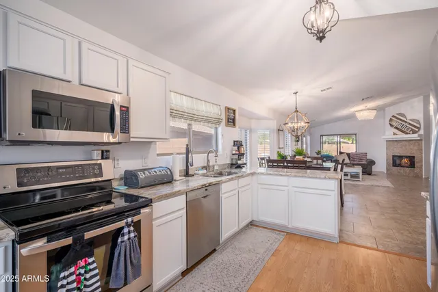 a kitchen with sink cabinets and counter top space