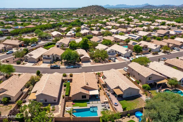 an aerial view of a city with lots of residential buildings