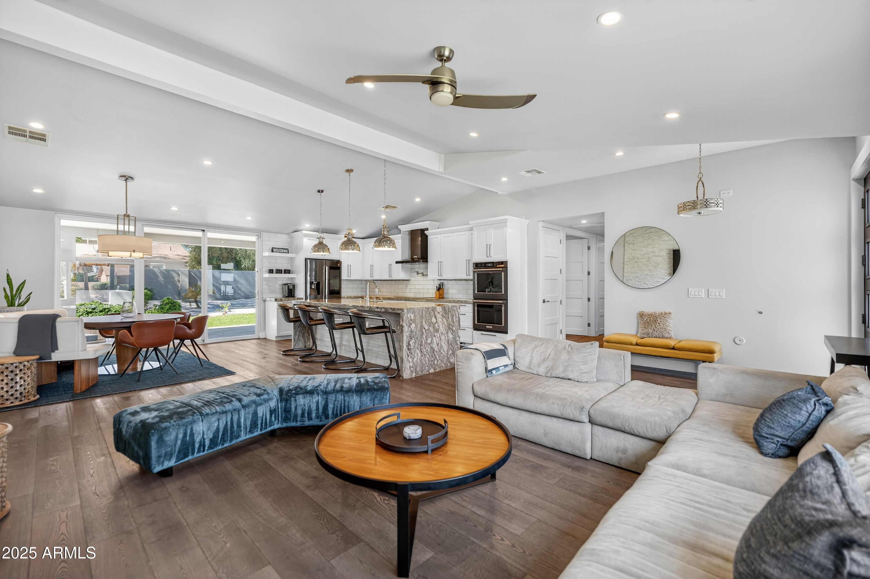 11026 North 42nd Street Phoenix, AZ 85028 - Photo 2 of 43 a living room with furniture kitchen view and a large window