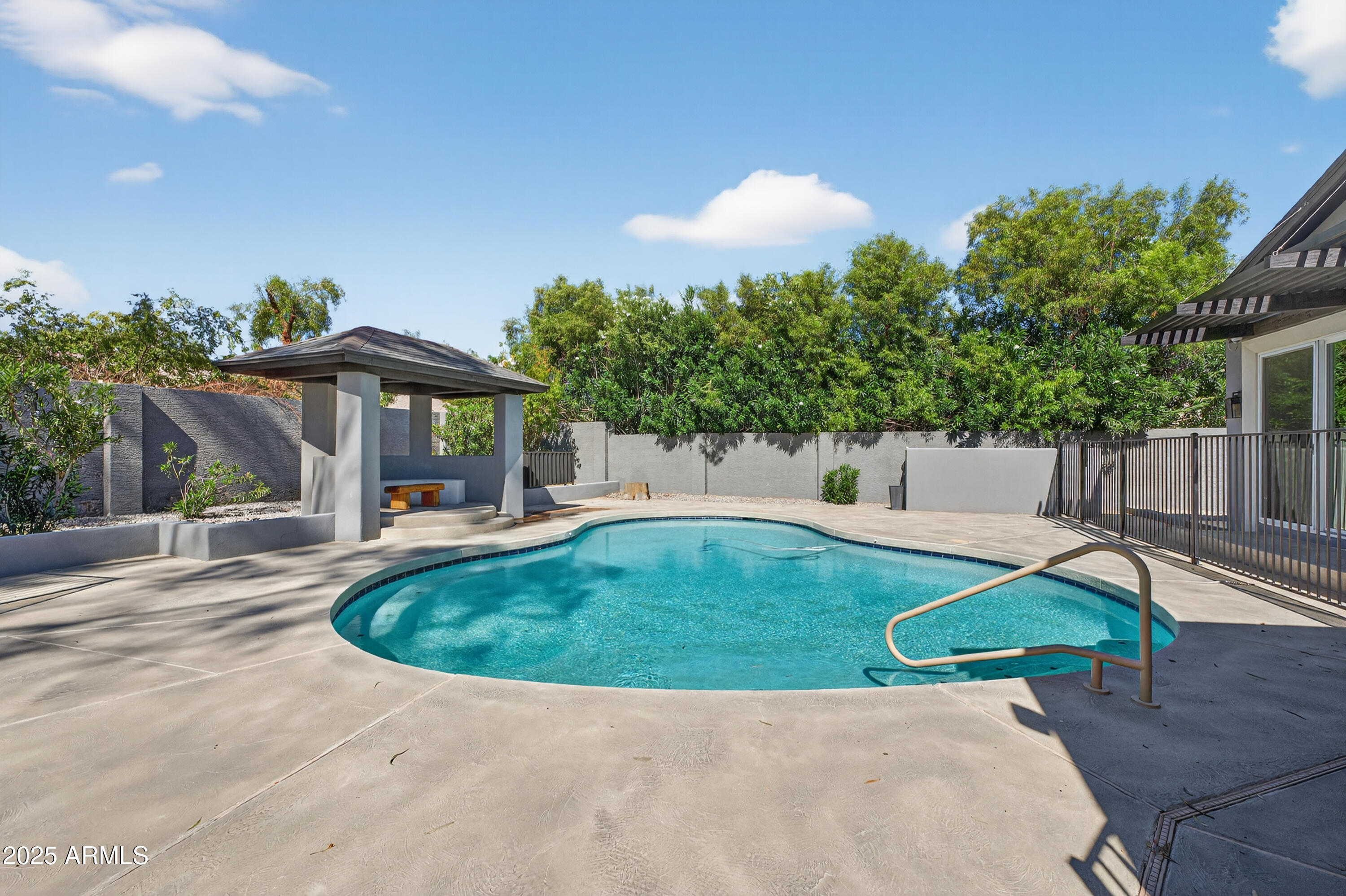 11026 North 42nd Street Phoenix, AZ 85028 - Photo 40 of 43 a view of a backyard with a patio