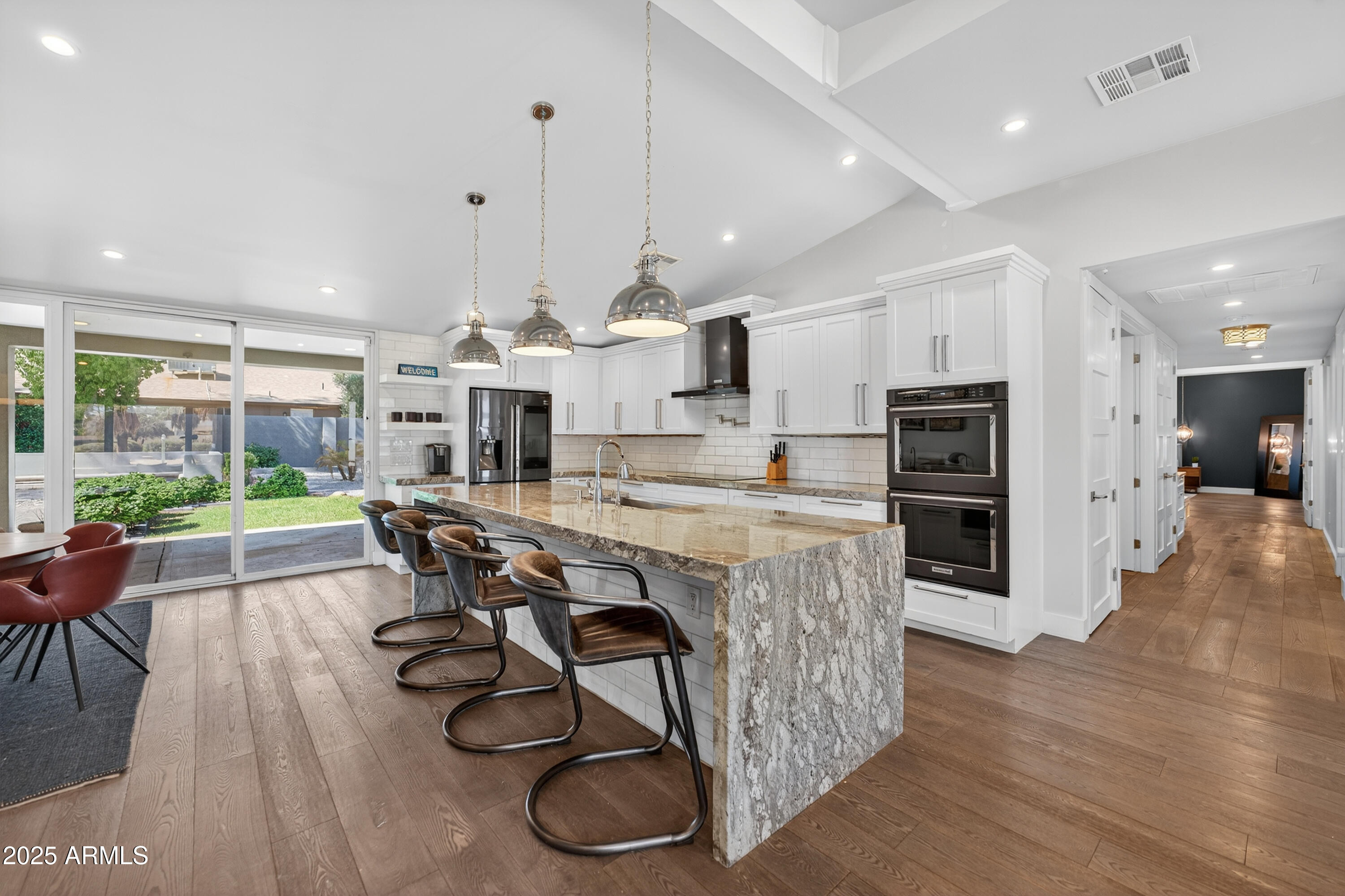 11026 North 42nd Street Phoenix, AZ 85028 - Photo 8 of 43 a living room with furniture a fireplace and a table
