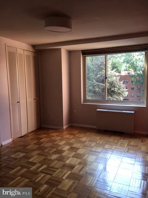 4000 Tunlaw Road Northwest, Unit 414 Washington, DC 20007 - Photo 13 of 14 a view of an empty room with a window