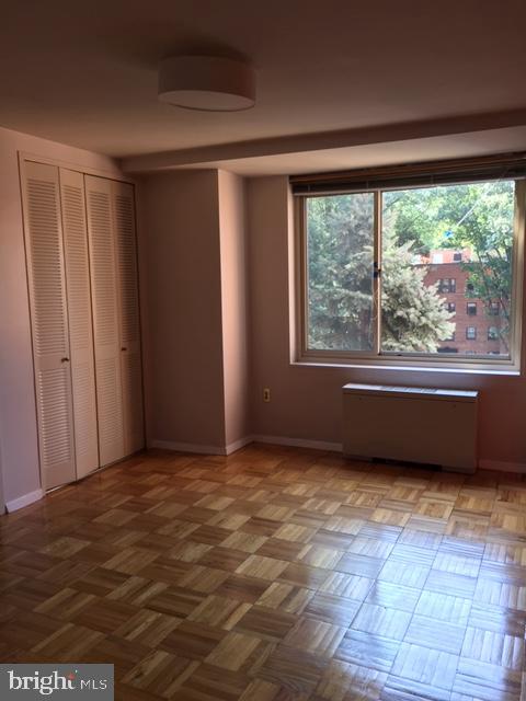 4000 Tunlaw Road Northwest, Unit 414 Washington, DC 20007 - Photo 14 of 14 a view of an empty room with a window
