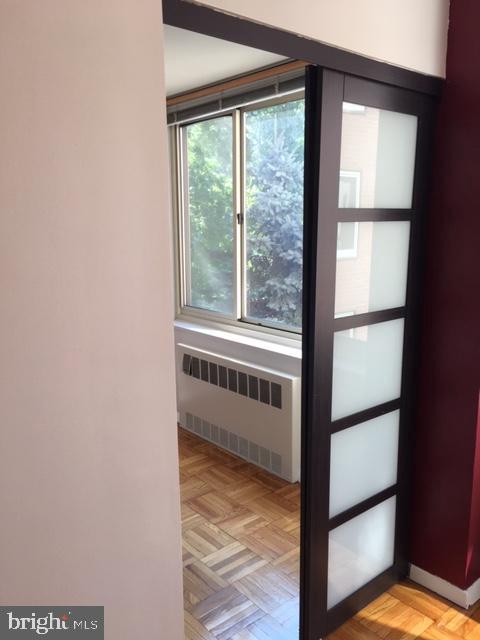 4000 Tunlaw Road Northwest, Unit 414 Washington, DC 20007 - Photo 3 of 14 a view of an empty room with a window