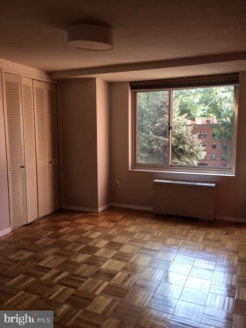 4000 Tunlaw Road Northwest, Unit 414 Washington, DC 20007 - Photo 6 of 14 a view of an empty room with a window