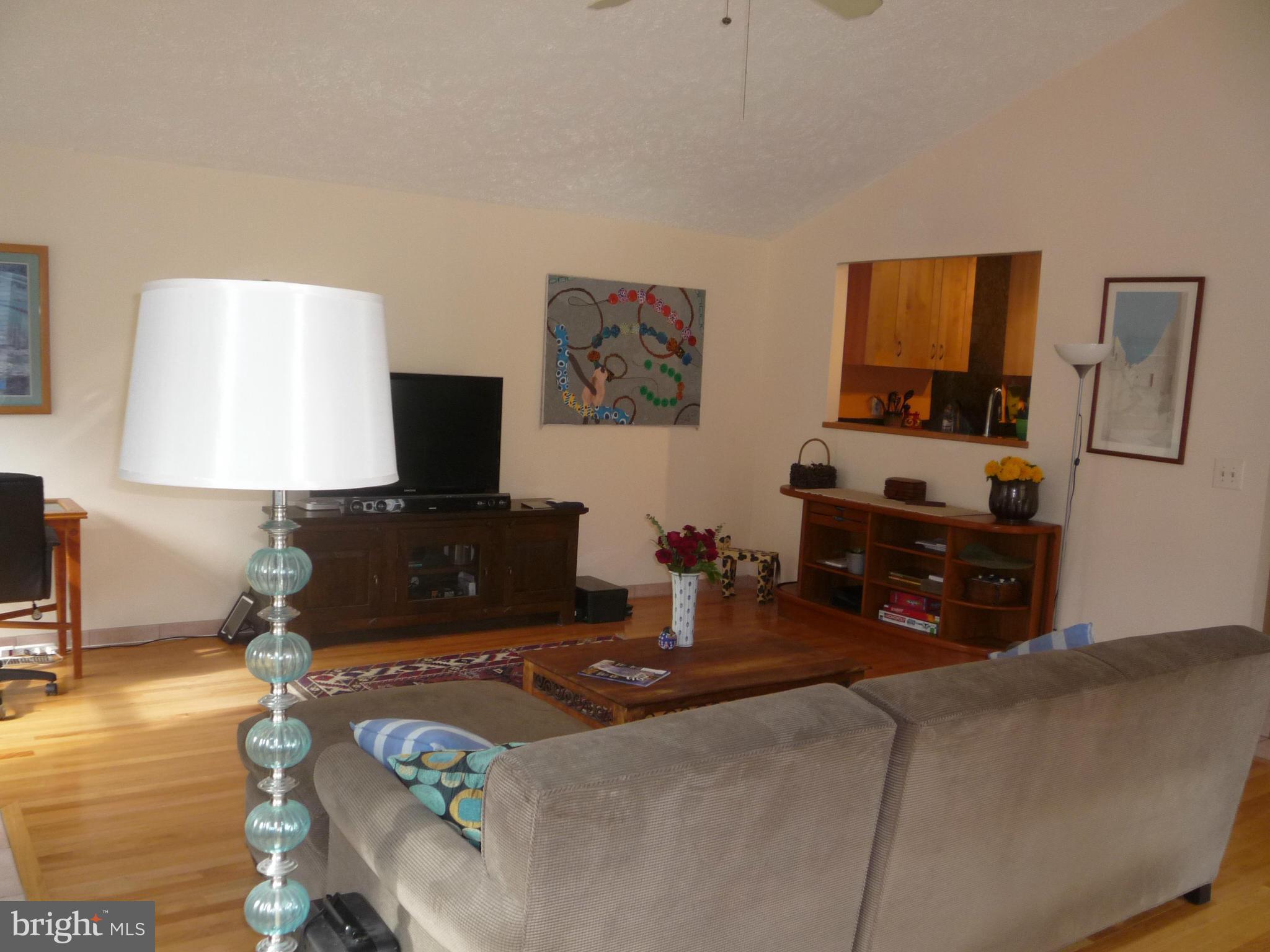 3138 Stonehenge Drive Riva, MD 21140 - Photo 14 of 29 a living room with furniture and a flat screen tv