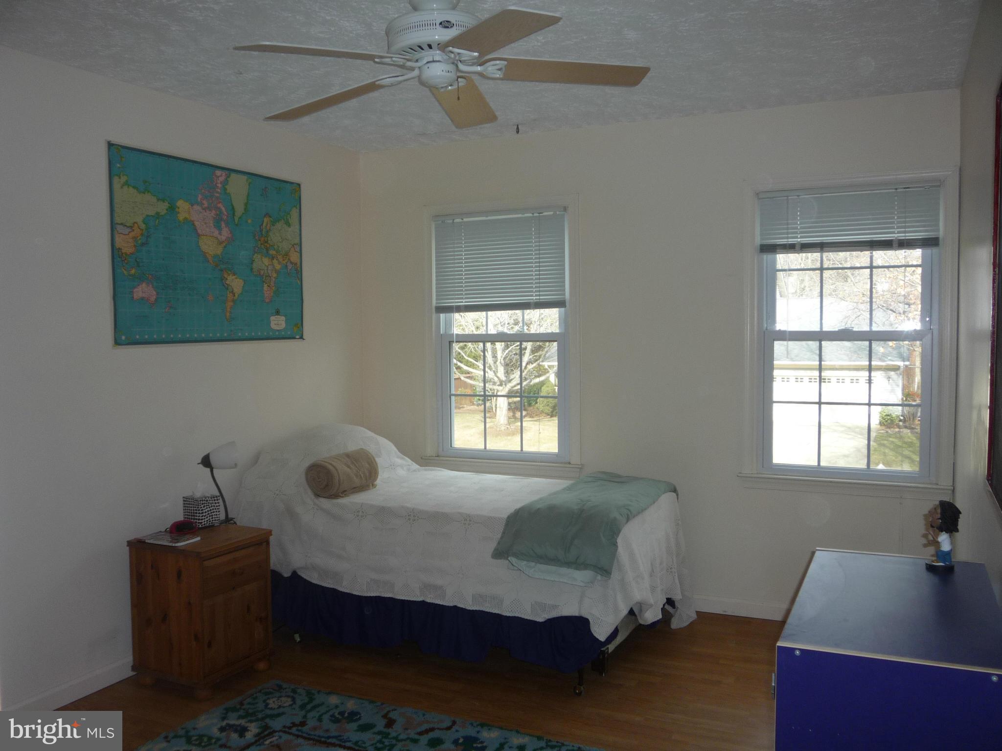 3138 Stonehenge Drive Riva, MD 21140 - Photo 8 of 29 a bed room with a bed and a window