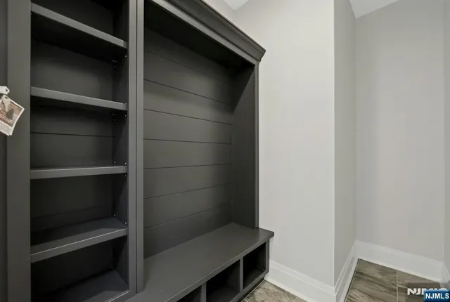 a kitchen with stainless steel appliances a sink and a refrigerator