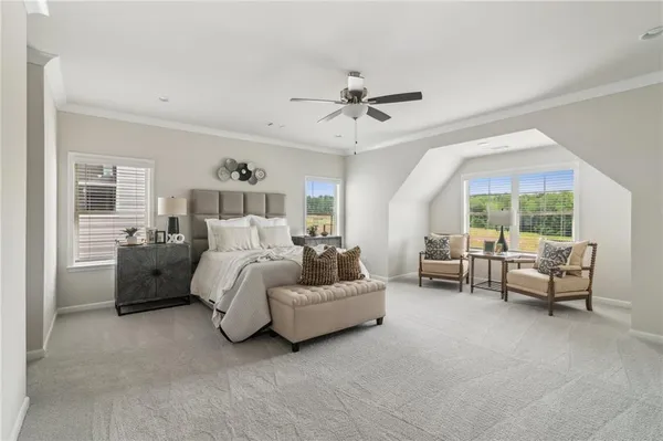 a bed room with furniture and a window